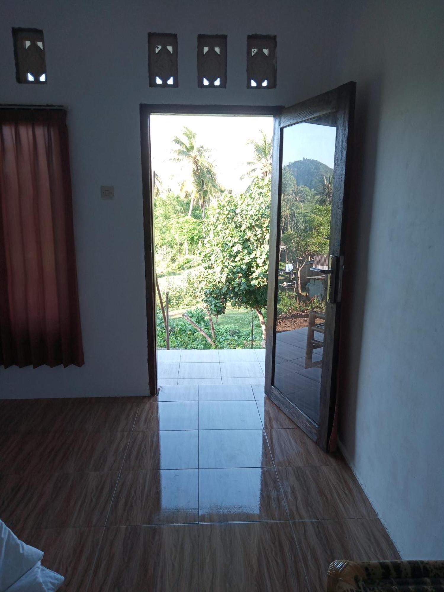 Ramdan Homestay Kuta  Luaran gambar